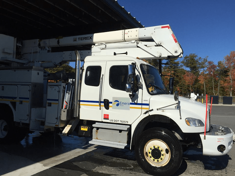 Image of a utility truck exiting an automated truck wash